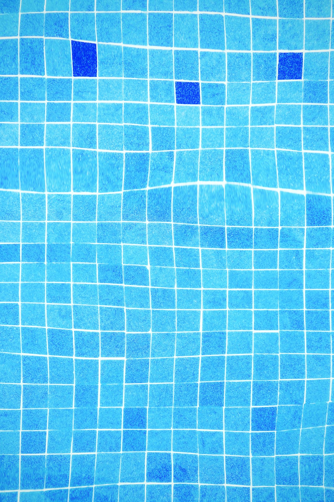 Swimming pool and surrounding tiled area